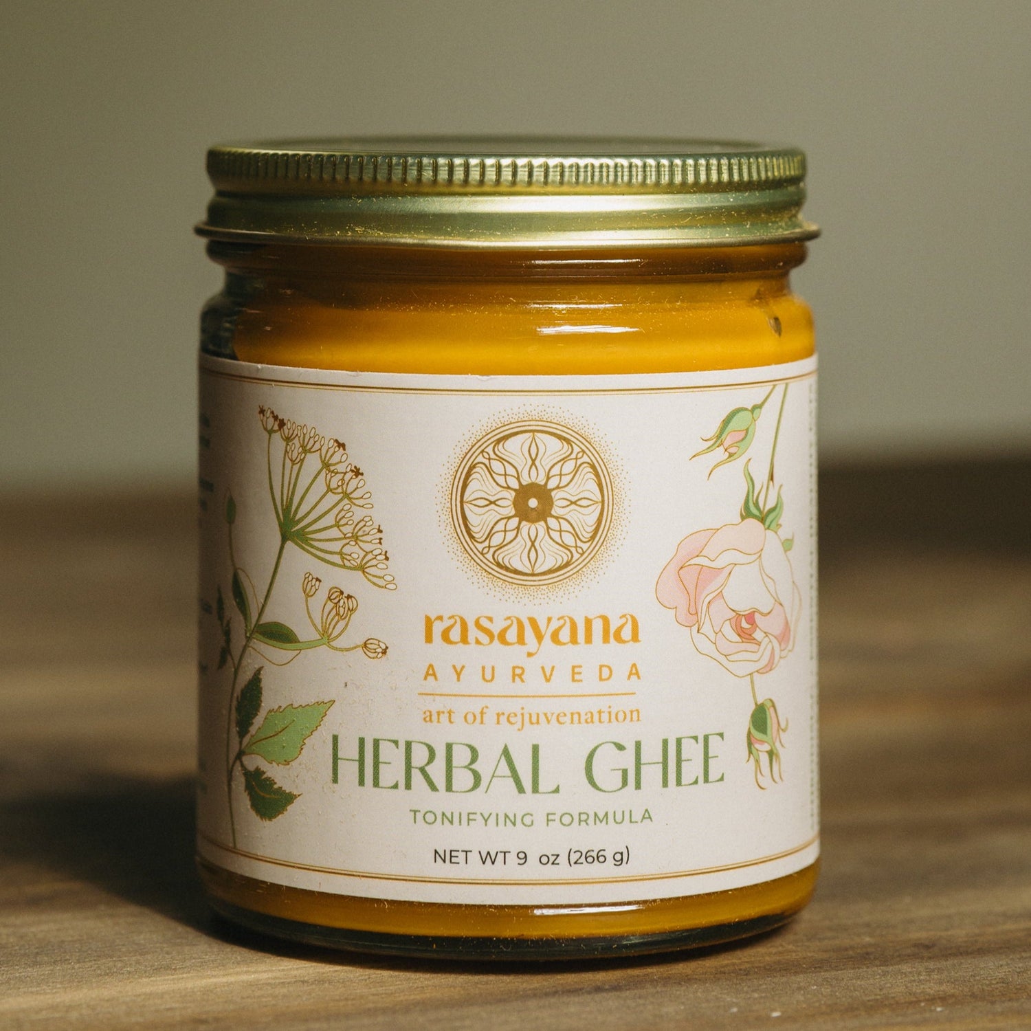 Jar of herbal ghee with Rasayana Ayurveda label on it. 