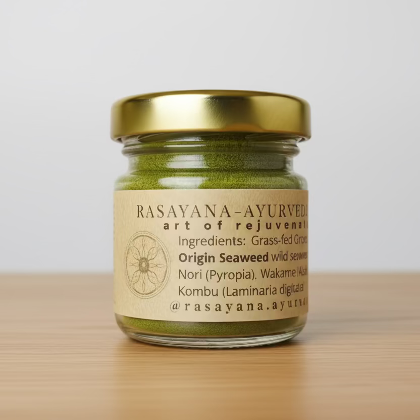 Jar of Rasayana-Ayurveda seaweed ghee on a wooden surface with a white wall background
